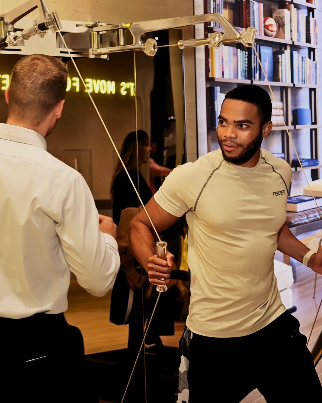 Post-workout reception with members socializing at Technogym Soho