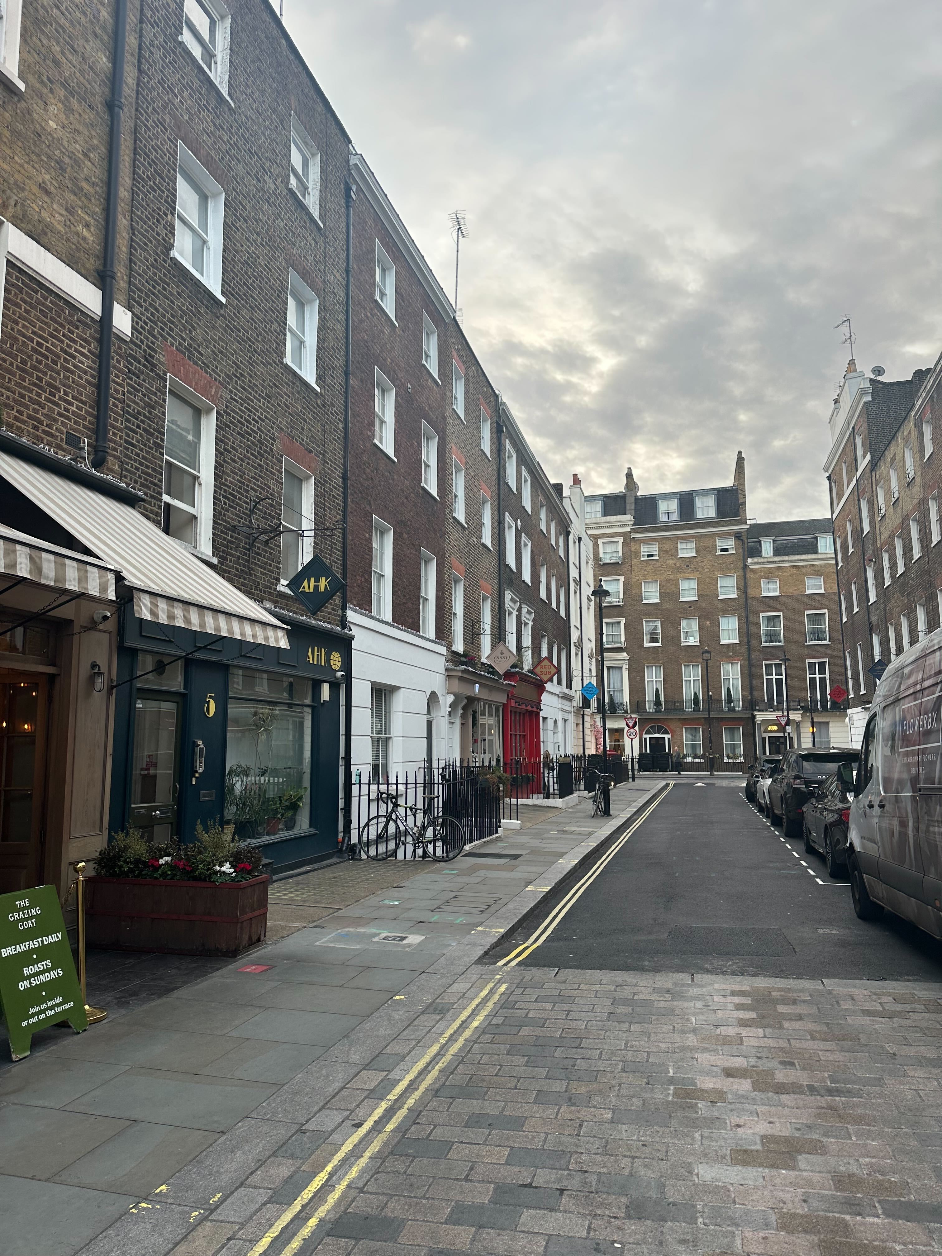 Hotel breakfast spread with pastries, fruit, and coffee at Nobu Hotel London