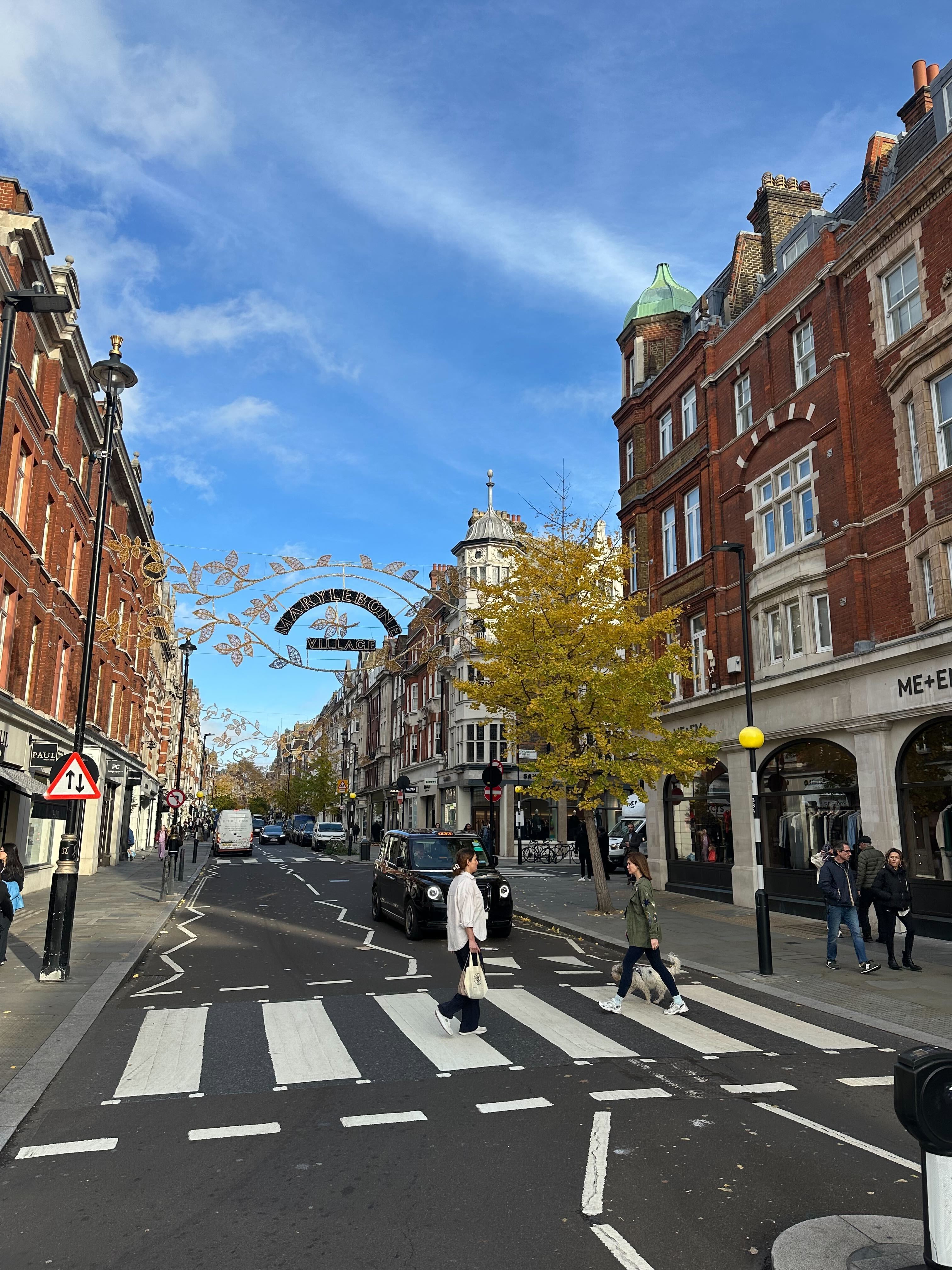 Marylebone High Street with pedestrians and boutique storefronts near Nobu Hotel London