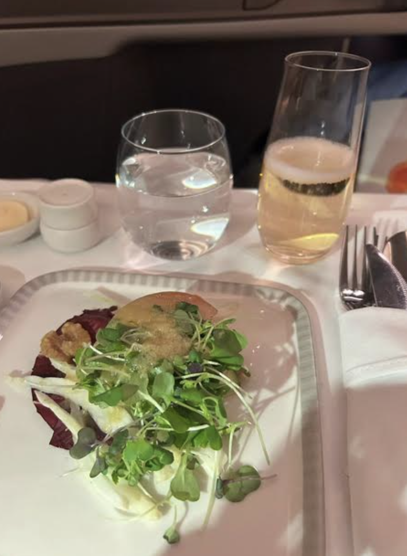 Shrimp appetizer and champagne on Singapore Airlines